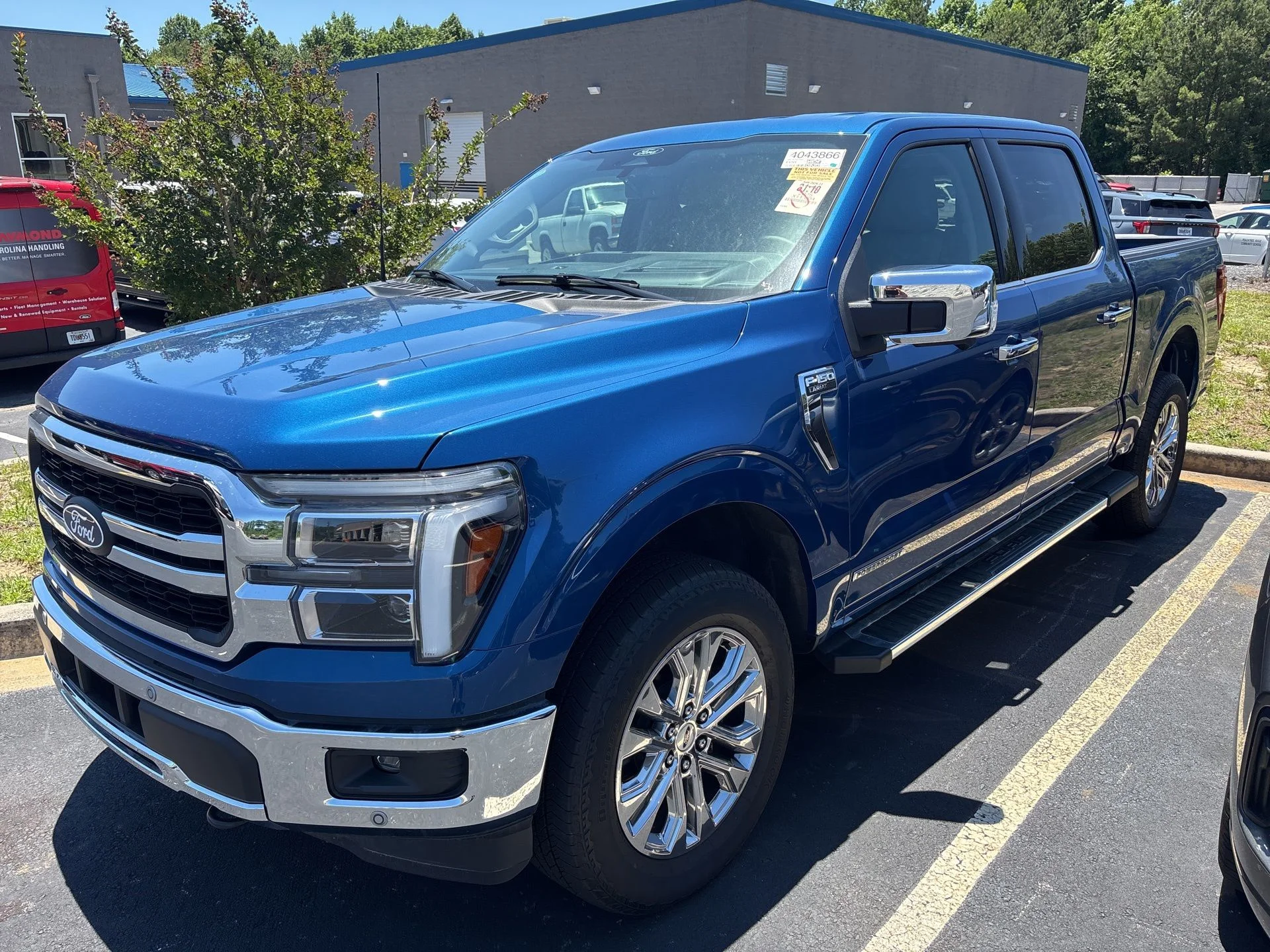 Certified Used 2025 Blue Metallic Ford Lariat image 1