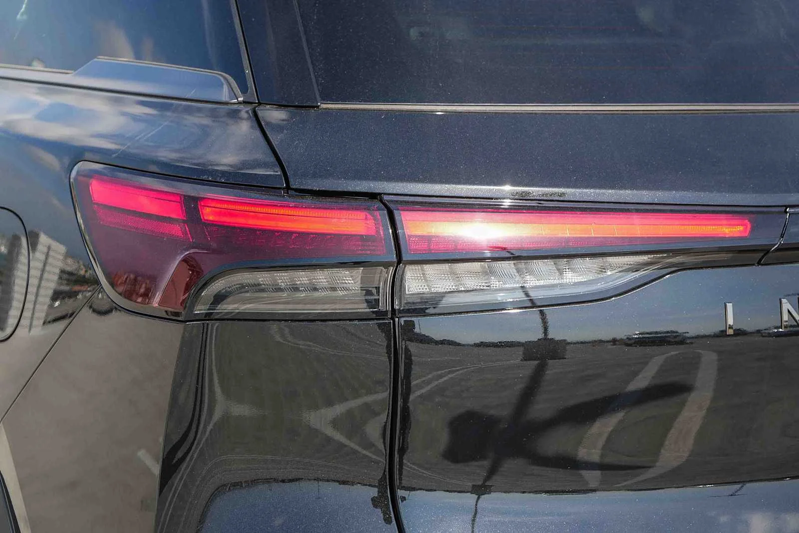 New 2026 MINERAL BLACK INFINITI Sport AWD image 9