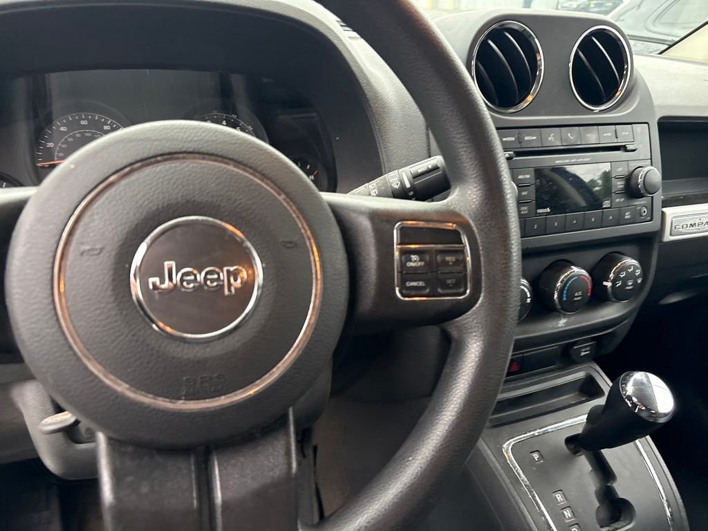 Used 2016 Blue Jeep Sport image 6