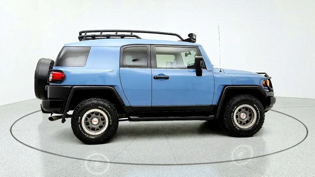 Used 2014 Heritage Blue Toyota 4WD 4dr Automatic image 4