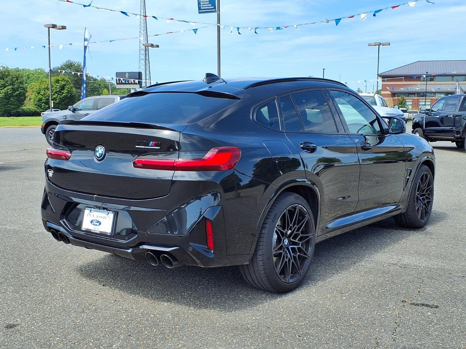 Used 2024 Black Sapphire Metallic BMW  image 2