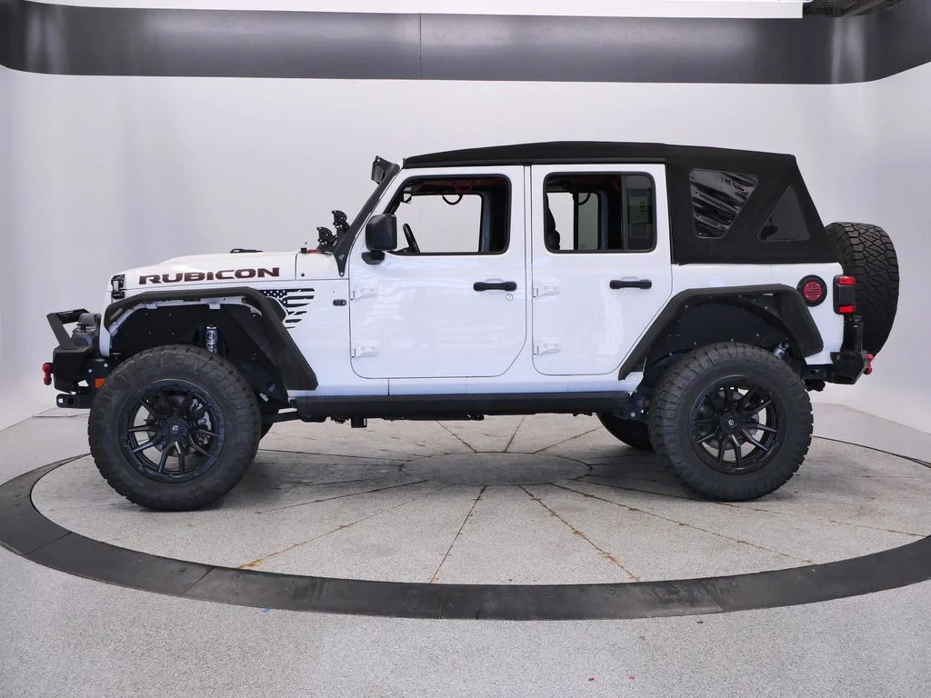 Used 2023 Jeep Wrangler 4-Door Rubicon with VIN 1C4HJXFNXPW504137 for sale in Coon Rapids, Minnesota