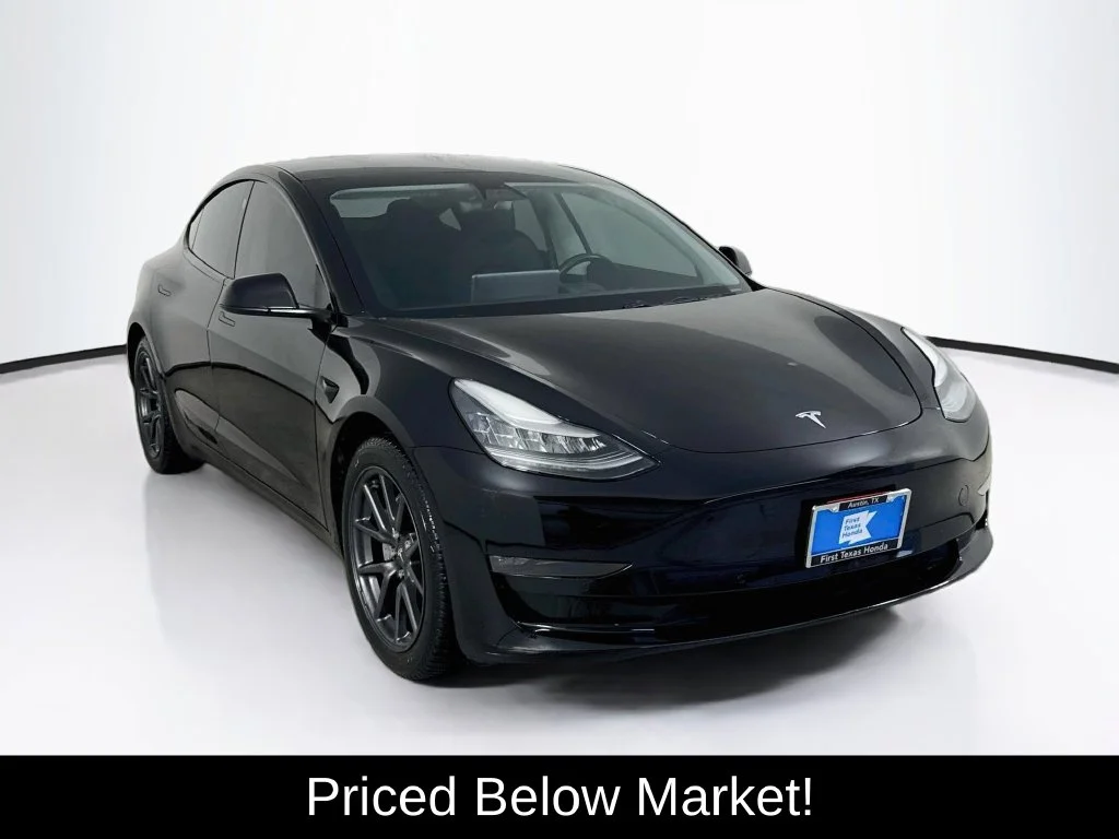 Used 2019 Solid Black Tesla Long Range image 1
