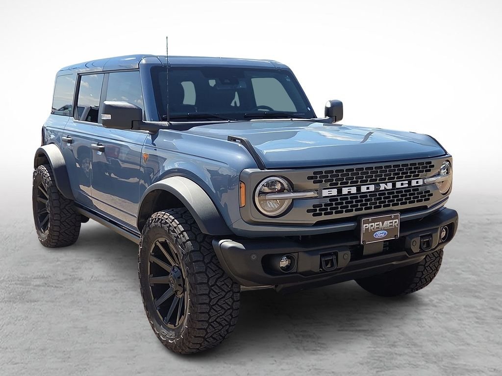 Used 2025 Azure Gray Metallic Ford Badlands image 1