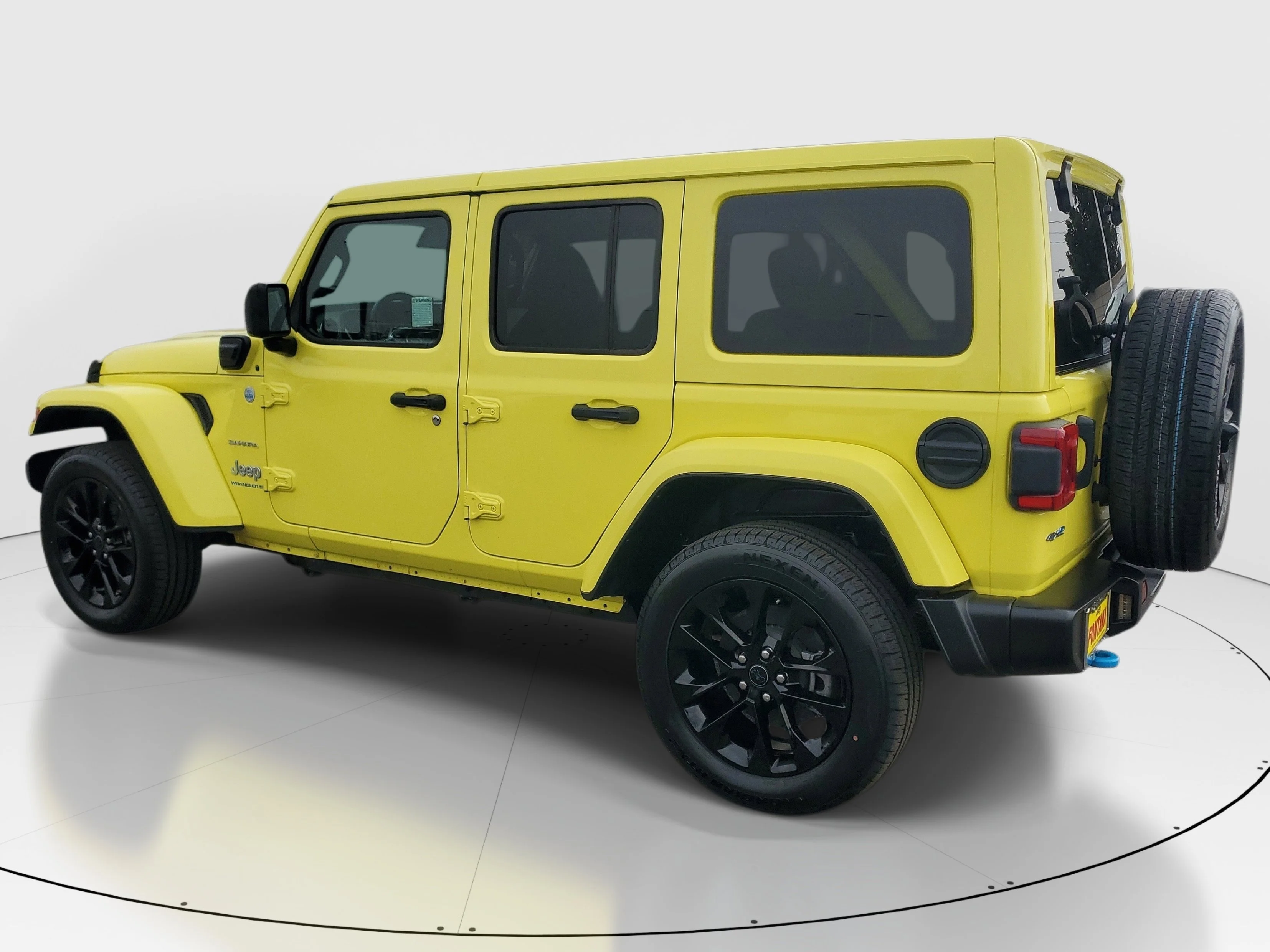 Used 2024 Yellow Jeep Sahara 4xe image 3