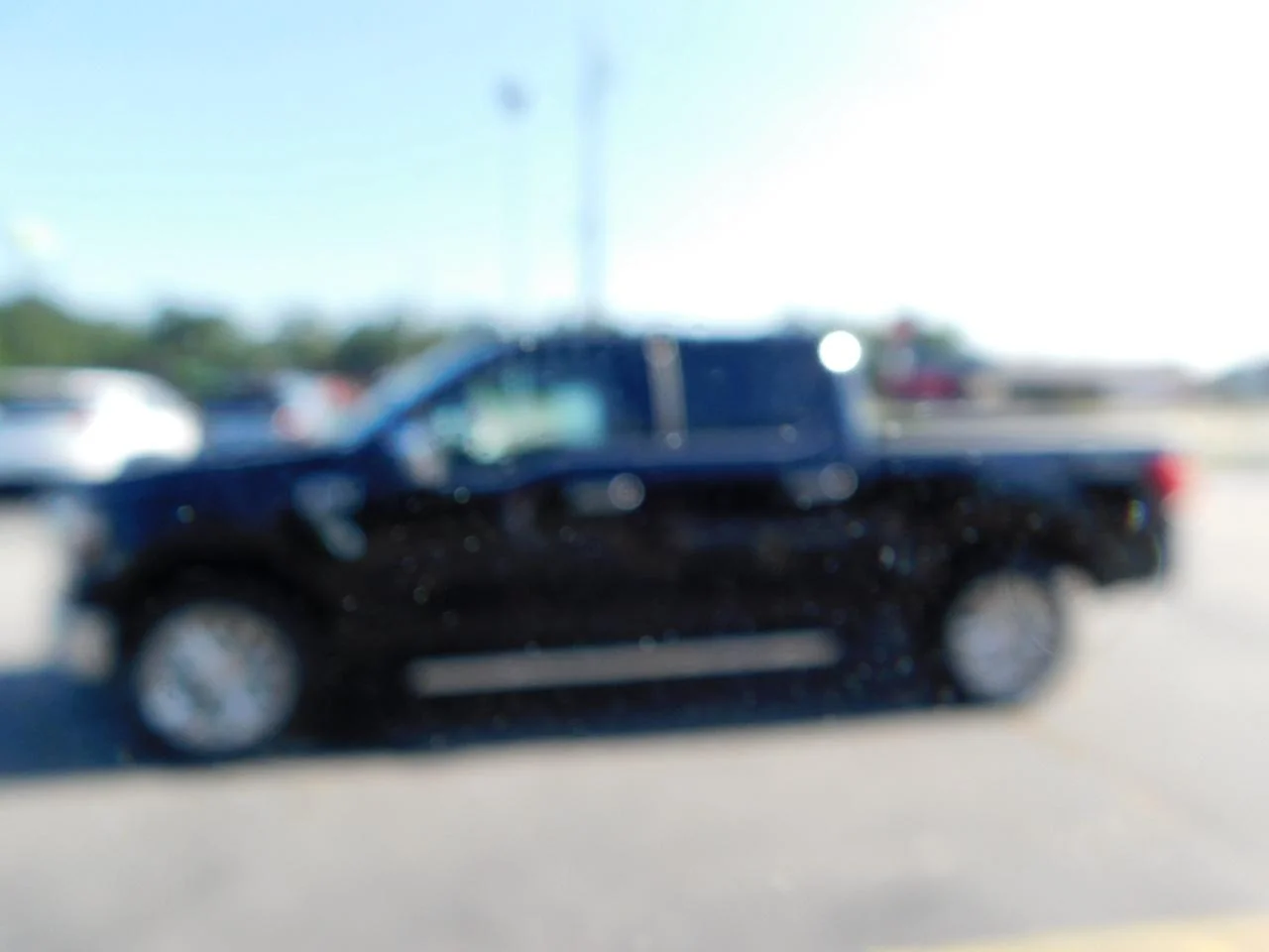 New 2026 Agate Black Metallic Ford Lariat® image 5
