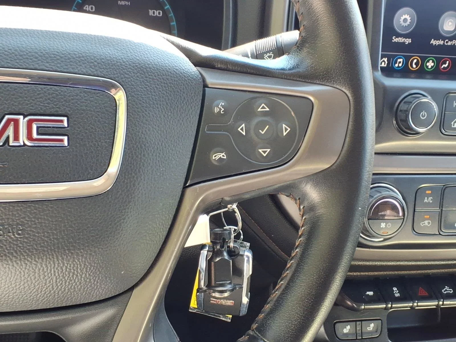 Used 2022 Satin Steel Metallic GMC 4WD AT4 with Leather image 18