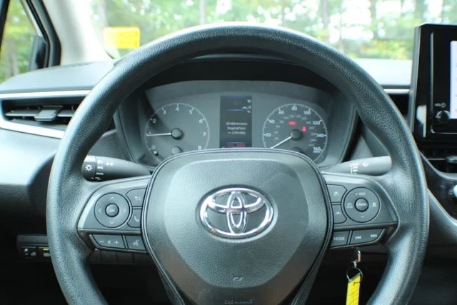 Used 2025 Midnight Black Metallic Toyota LE image 8