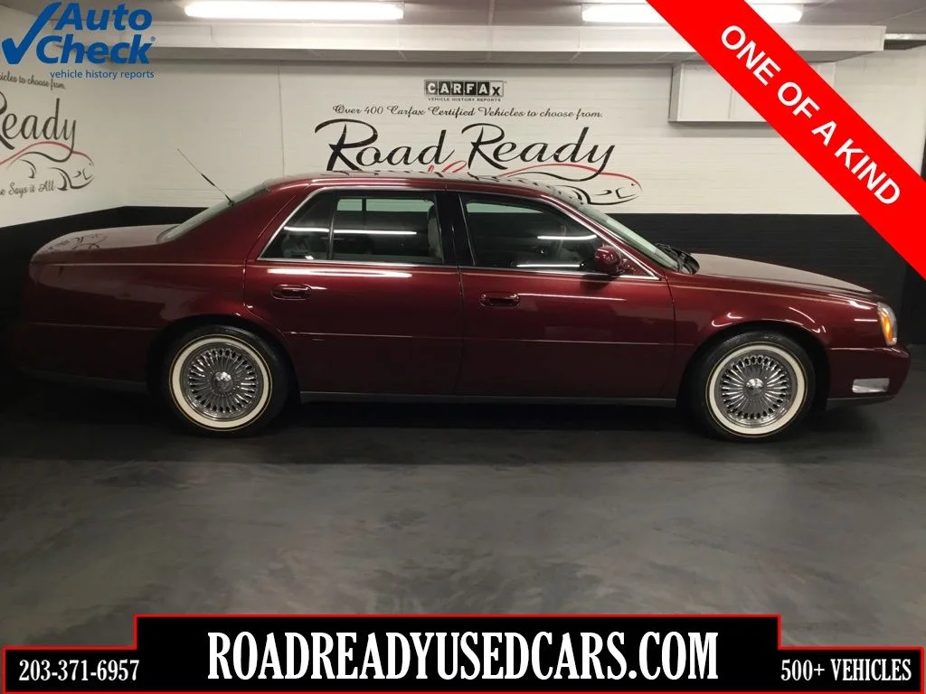 Used 2000 Red Cadillac DHS image 1