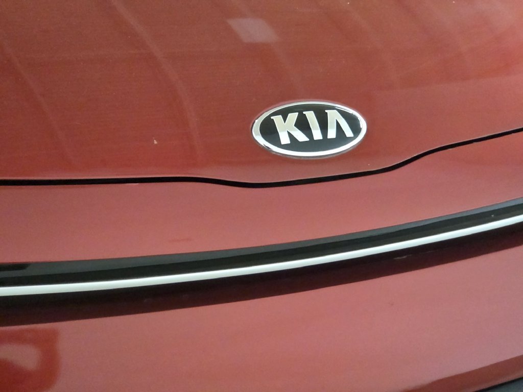 Used 2021 Orange Kia LX image 13