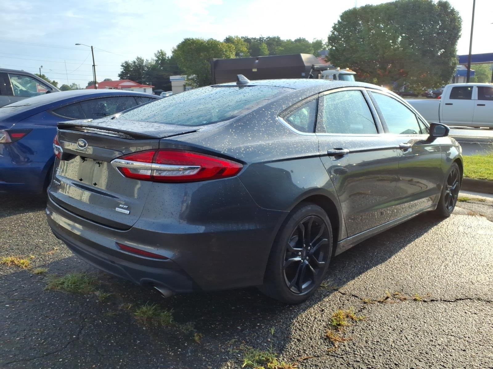 Used 2020 Magnetic Metallic Ford SE image 5