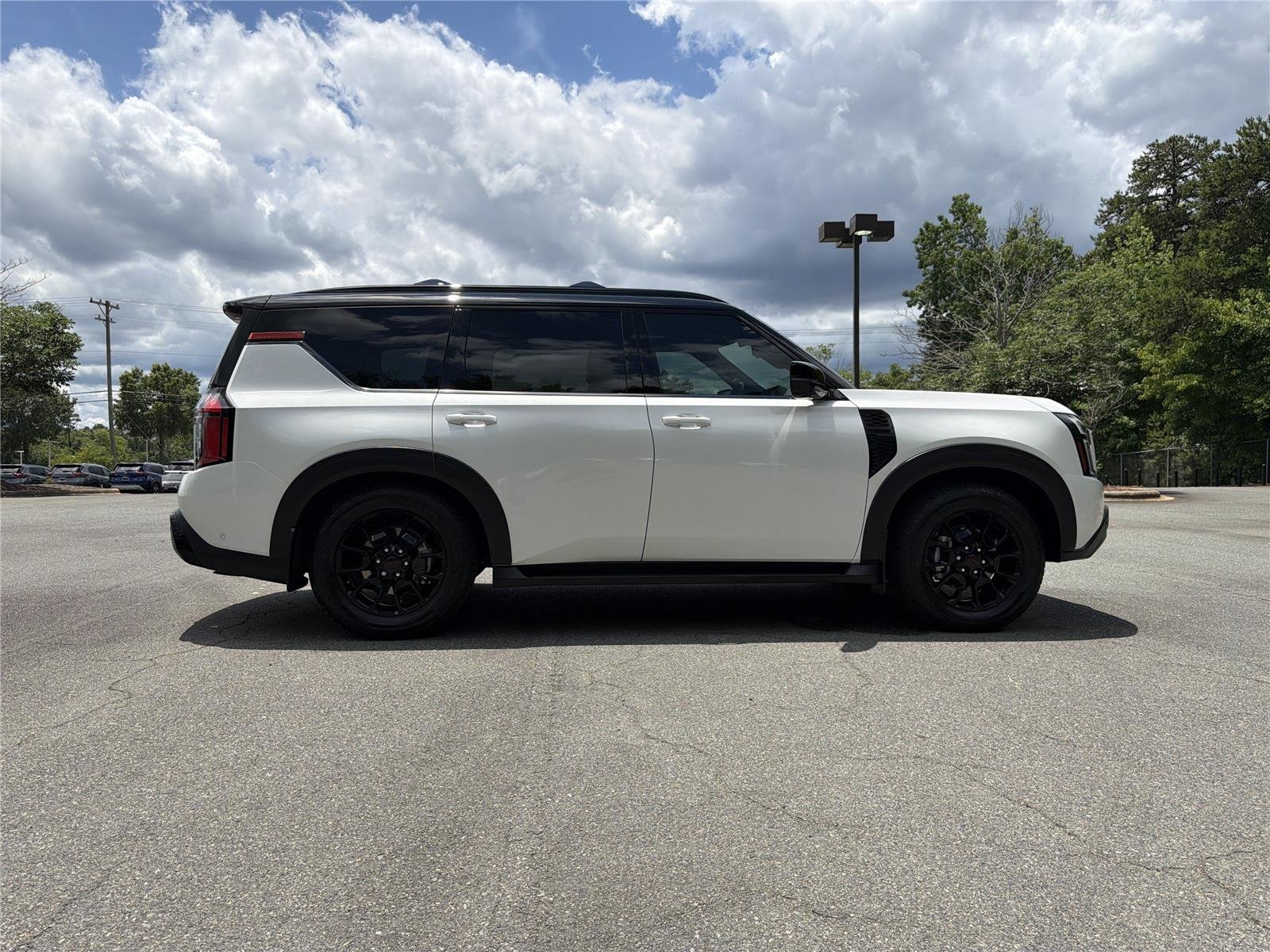 Used 2025 Aspen White Tricoat/Super Black Nissan PRO-4X image 28