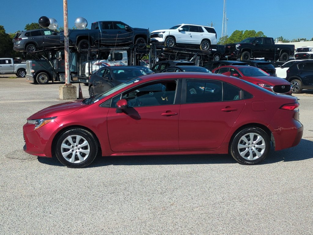 Used 2025 Red Toyota LE image 3