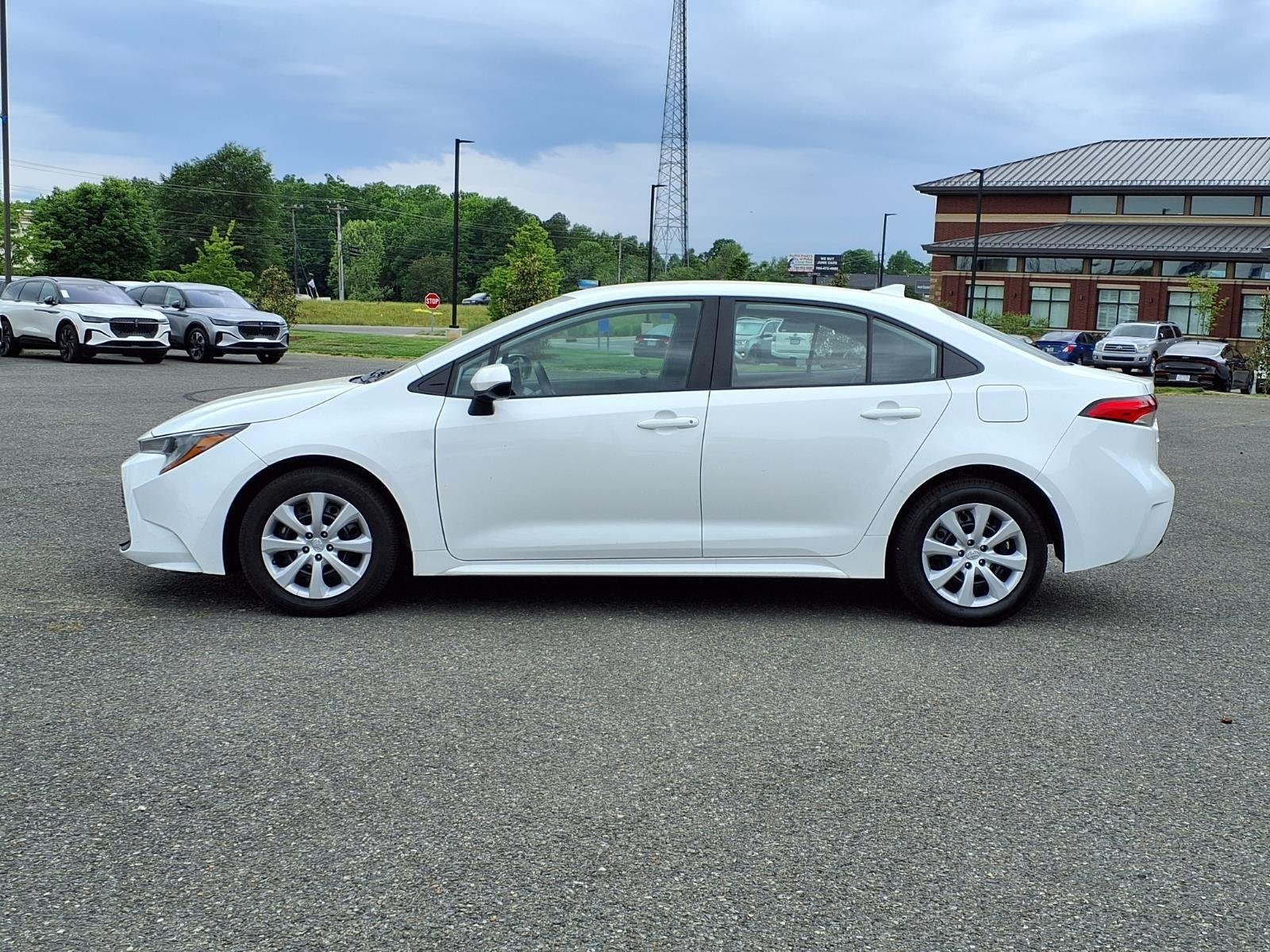 Used 2024 Midnight Black Metallic Toyota LE image 3