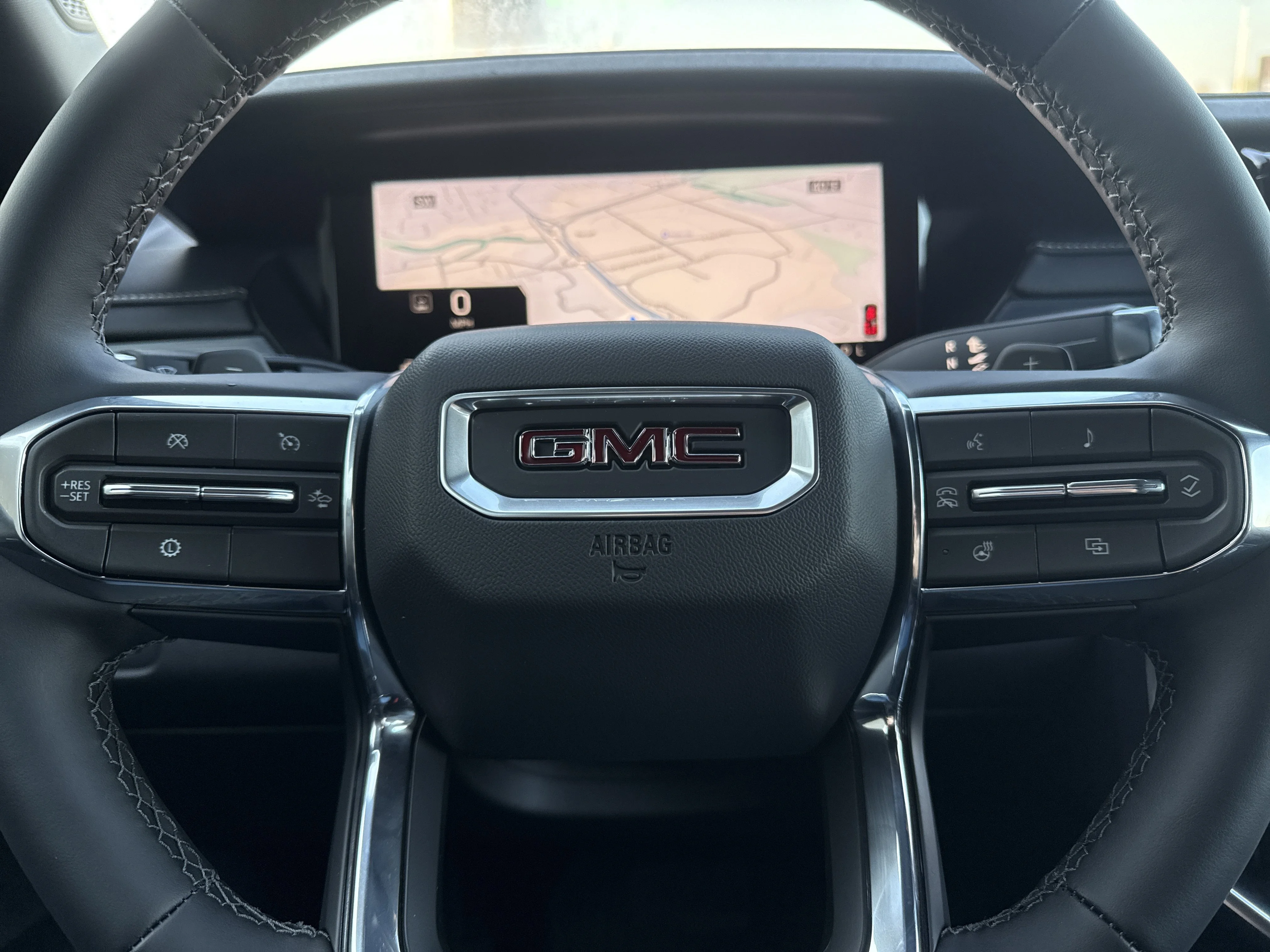New 2026 Glacier White Tricoat GMC AWD Elevation image 23