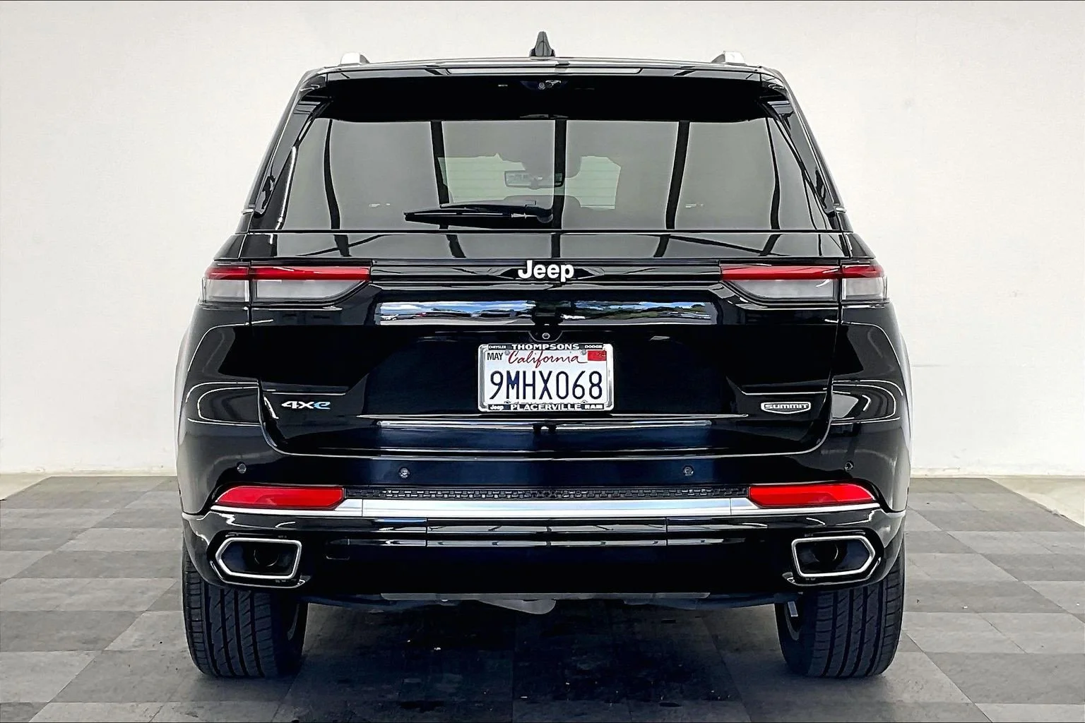 Used 2022 Diamond Black Crystal Pearlcoat Jeep Summit 4xe image 3