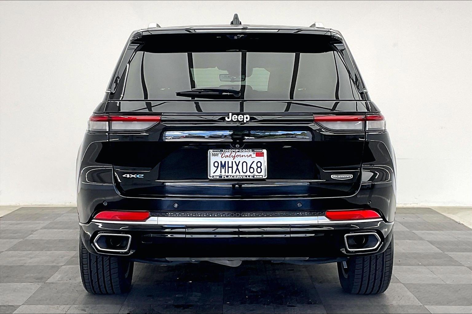 Used 2022 Diamond Black Crystal Pearlcoat Jeep Summit 4xe image 3
