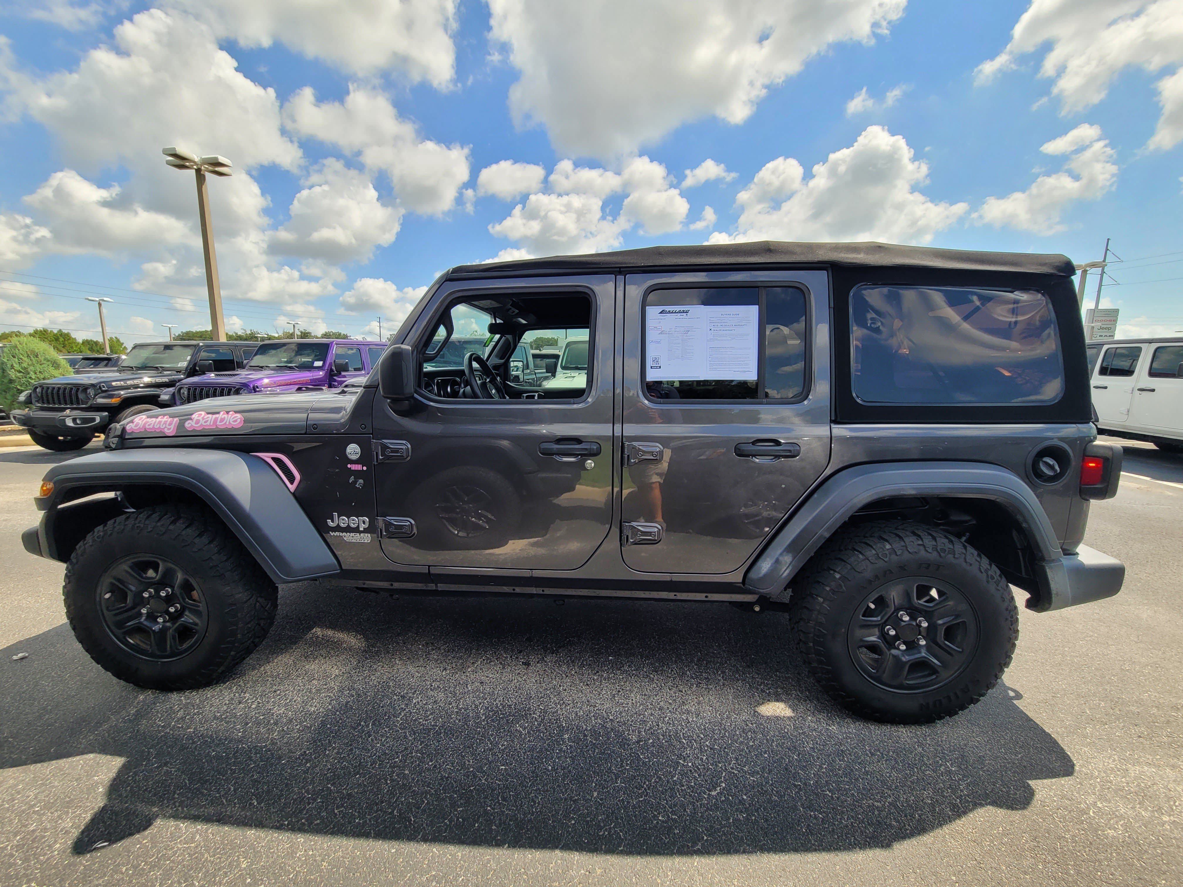 Used 2019 Granite Crystal Metallic Clearcoat Jeep Sport image 7