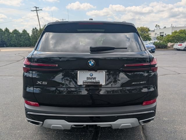 Certified Used 2024 Black Sapphire Metallic BMW xDrive40i image 3