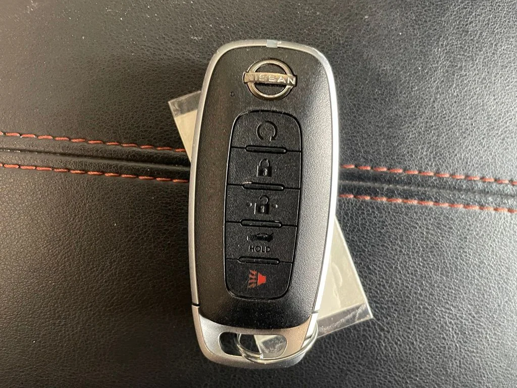 Certified Used 2025 Orange Nissan SR image 19