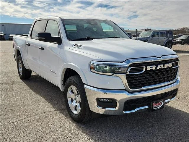 Used 2025 Bright White Clearcoat RAM Big Horn/Lone Star 4x4 Crew Cab 144.5 in. WB image 6