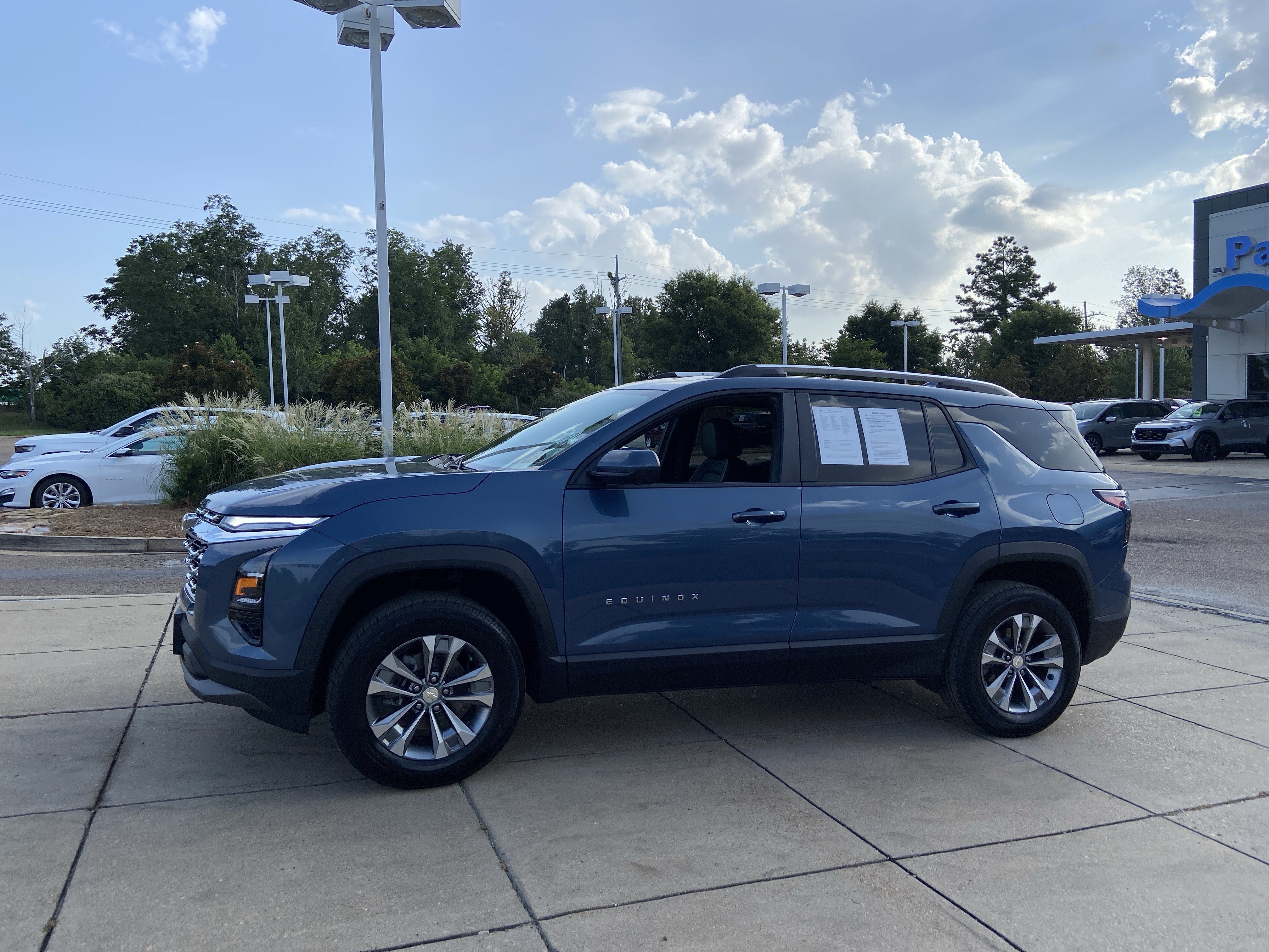 Used 2025 Lakeshore Blue Metallic Chevrolet AWD LT image 6