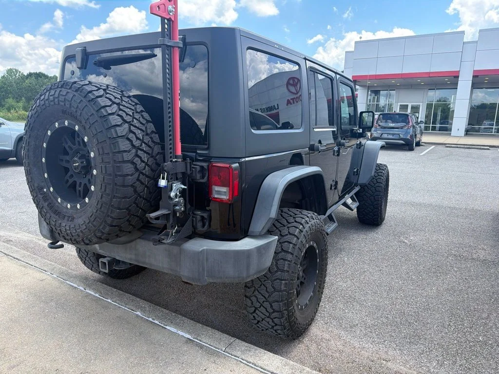Used 2015 Black Jeep Unlimited Sport image 9