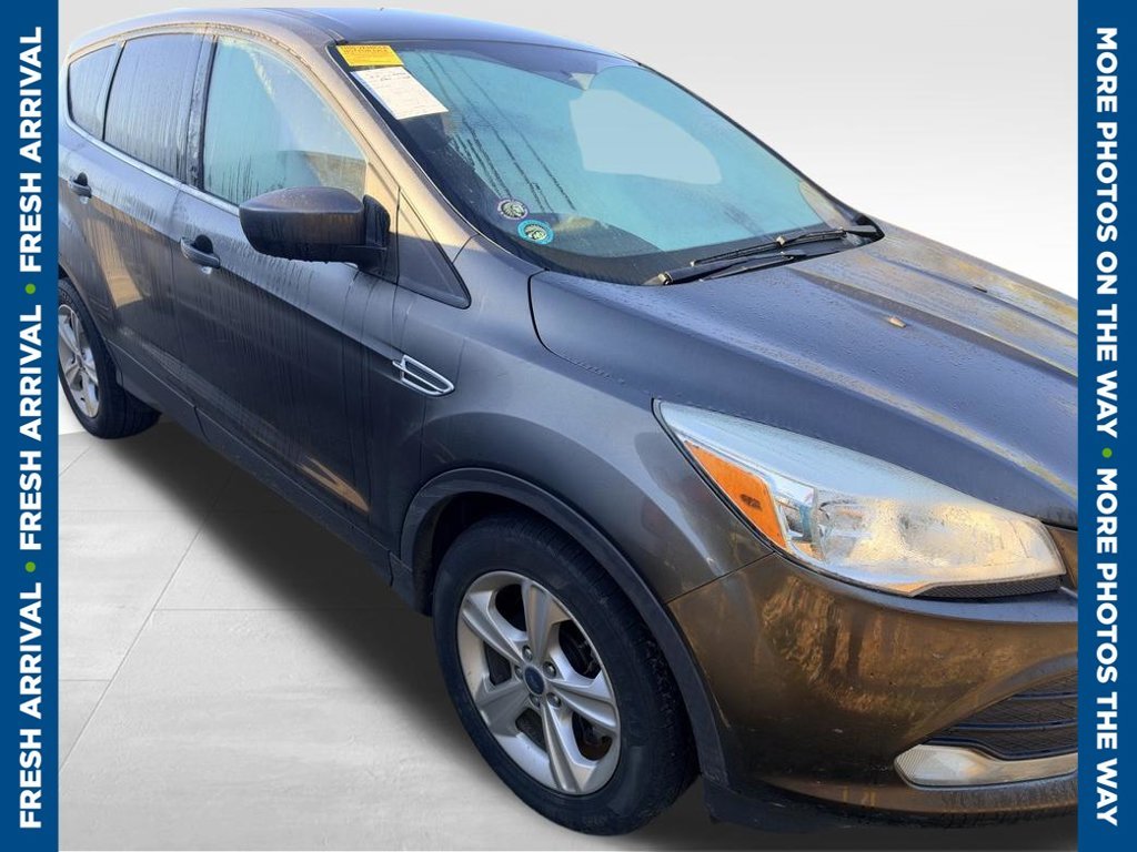 Used 2016 Gray Ford SE image 1
