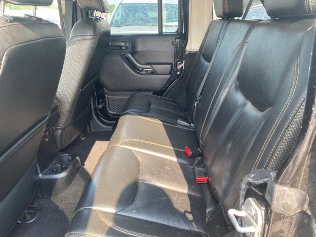 Used 2014 Black Jeep Unlimited Sahara Dragon Edition image 5