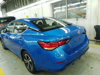 Used 2023 Electric Blue Metallic Nissan SV image 4