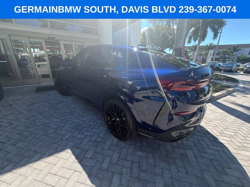 Certified Used 2024 Tanzanite Blue II Metallic BMW M60i image 5