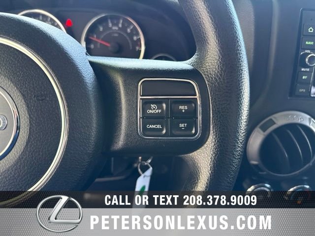 Used 2013 White Jeep Unlimited Sport image 21