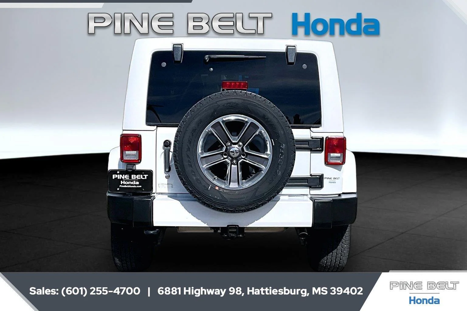 Used 2016 Bright White Clearcoat Jeep Sahara image 4