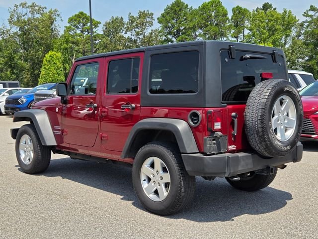 Used 2013 Red Jeep Unlimited Sport image 3
