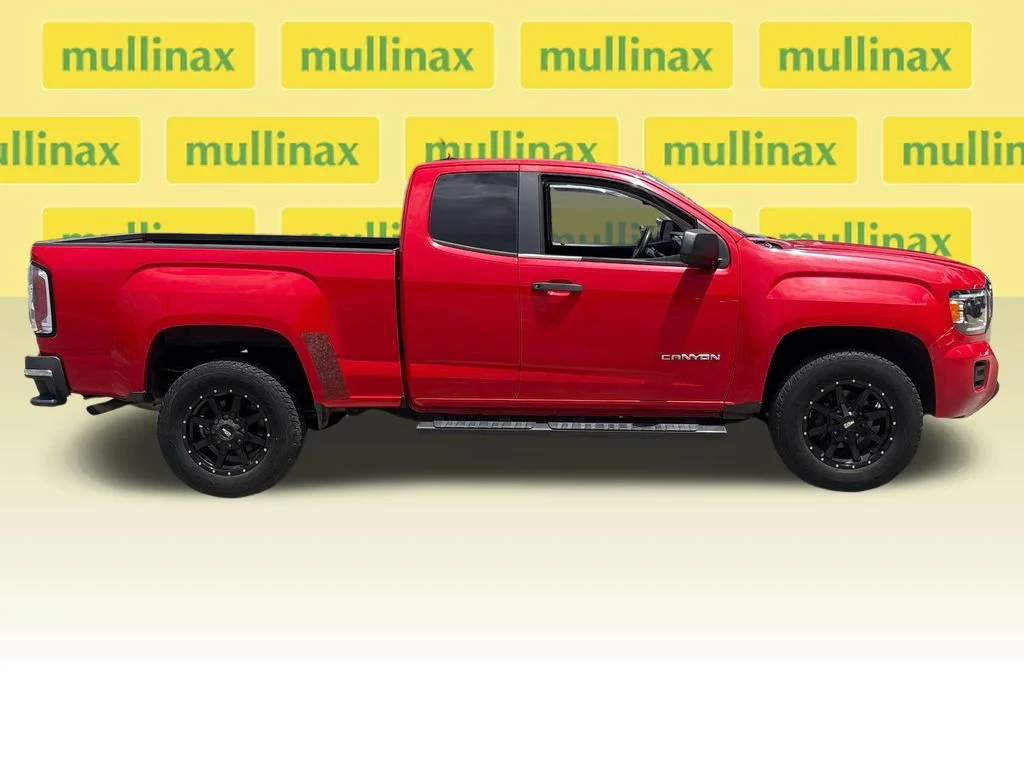 Used 2015 GMC Canyon Base with VIN 1GTH5AEA5F1257427 for sale in New Smyrna Beach, FL