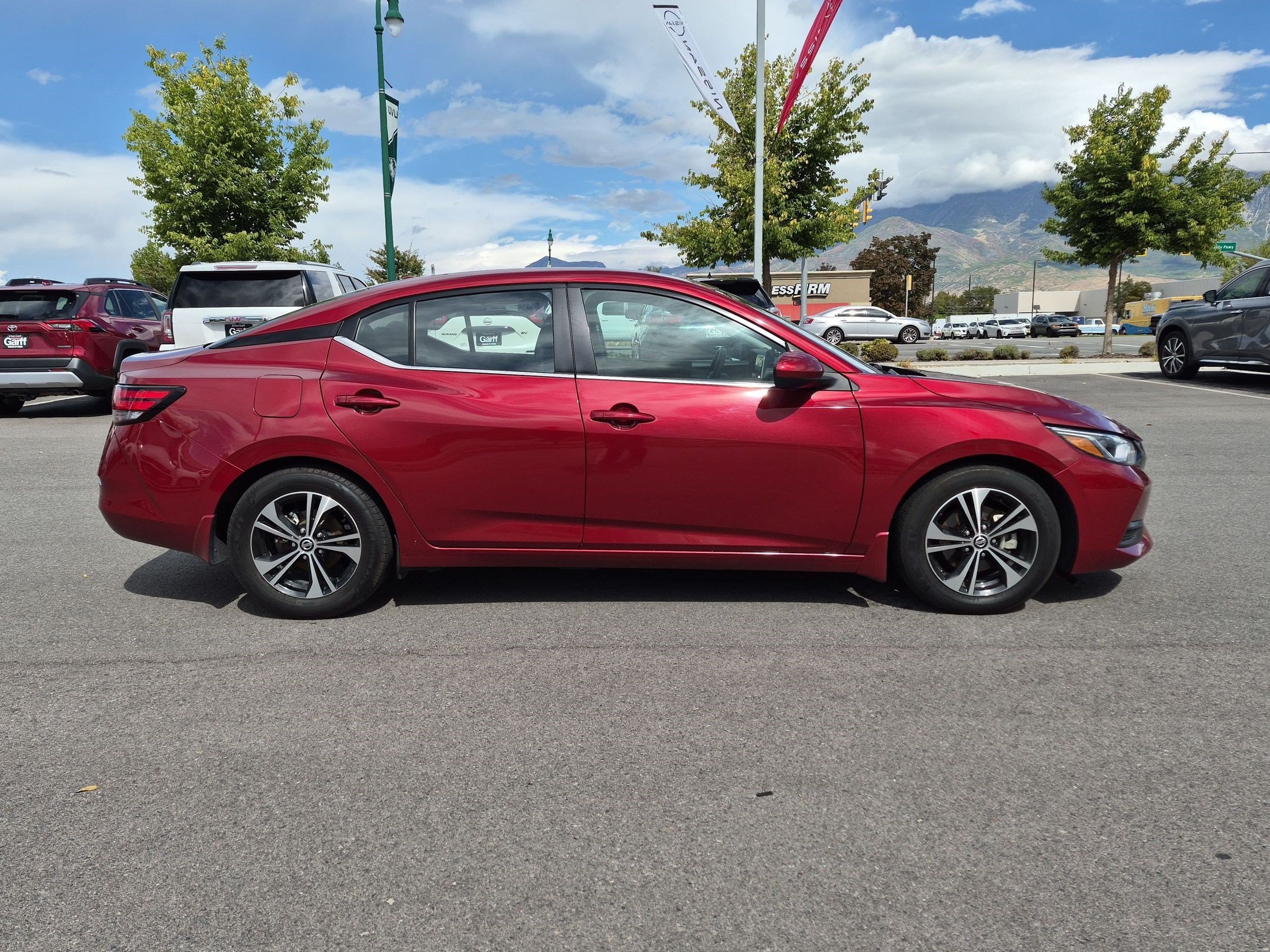 Used 2023 Scarlet Ember Tintcoat Nissan SV image 2