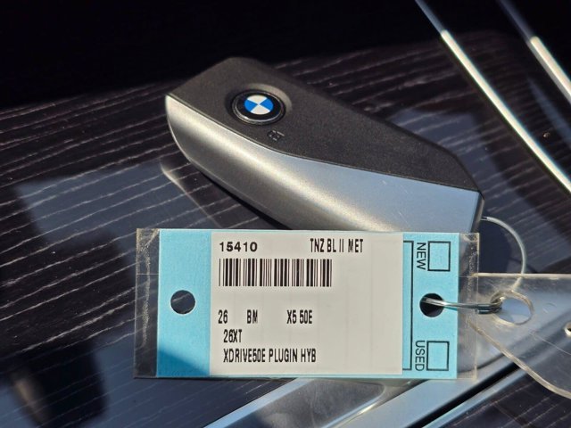 New 2026 Tanzanite Blue II Metallic BMW xDrive50e image 32