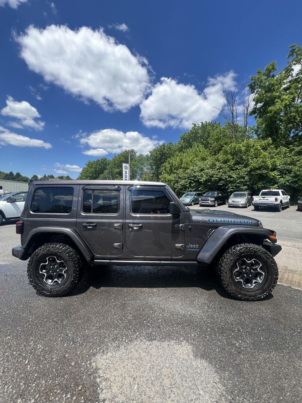 Used 2021 GRANITE CRYSTAL METALLIC CLEARCOAT JEEP UNLIMITED RUBICON image 2