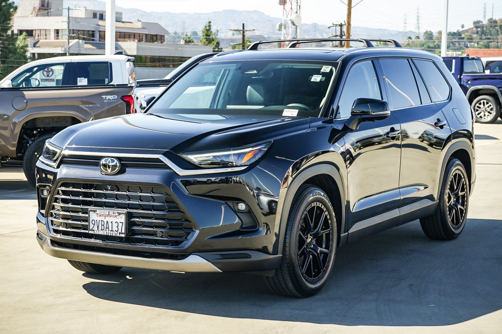 Certified Used 2025 Midnight Black Metallic Toyota Hybrid XLE image 5