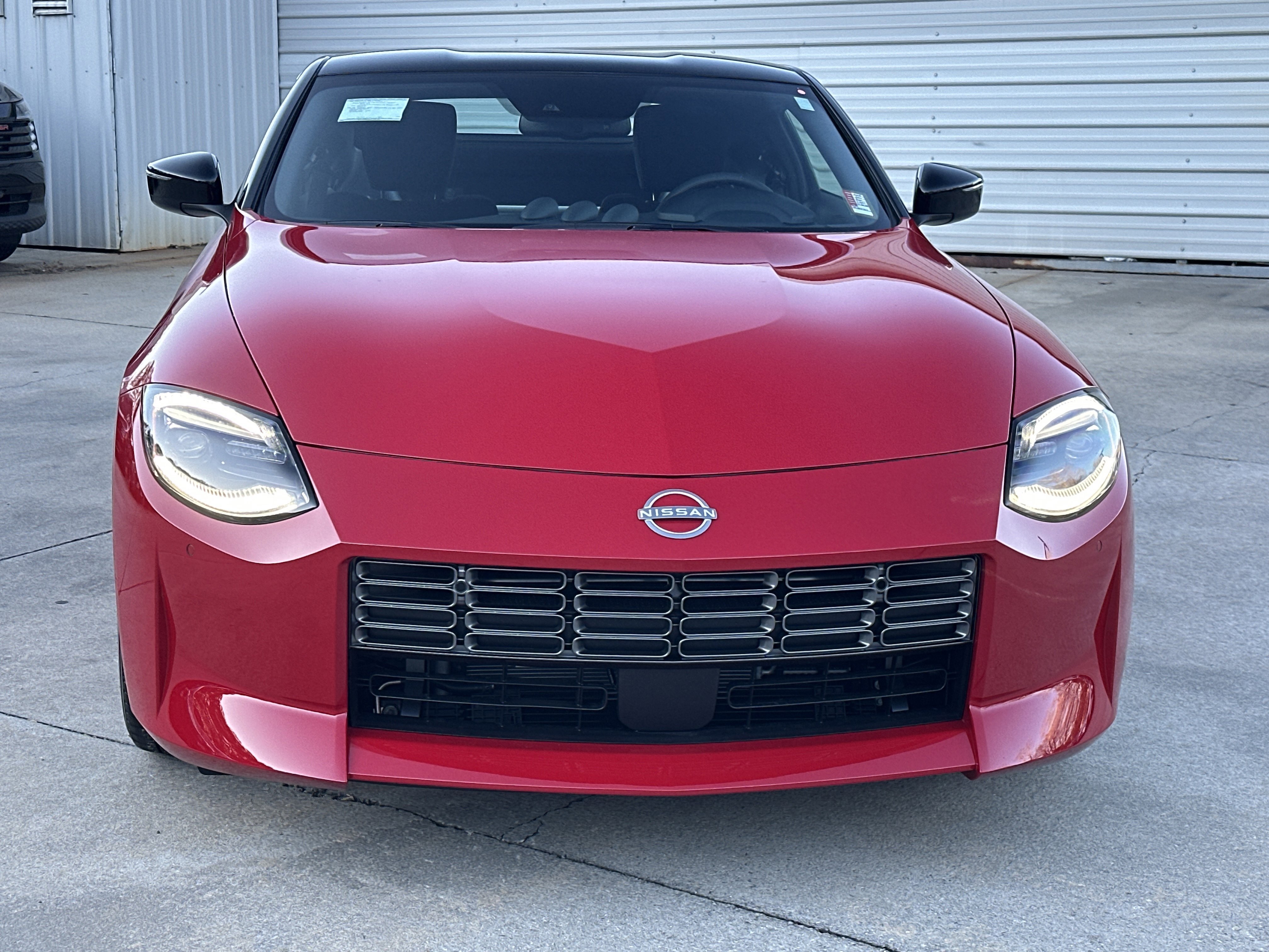 New 2026 Solid Red/Super Black Nissan Sport image 3