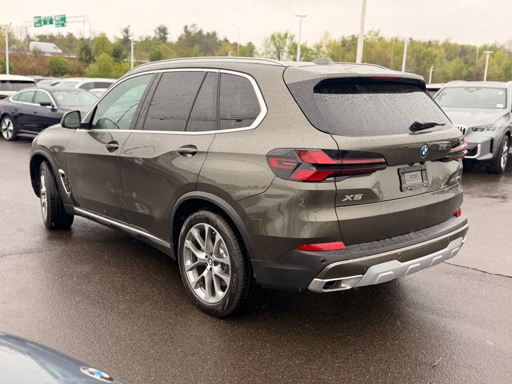 New 2026 Manhattan Green Metallic BMW xDrive50e image 3
