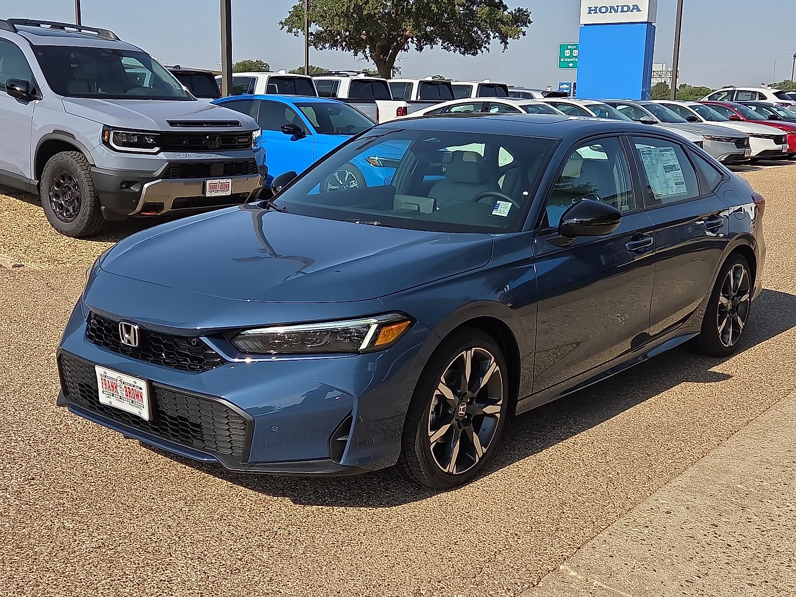 New 2026 Blue Lagoon Pearl Honda 2WD Sport Touring Hybrid image 1