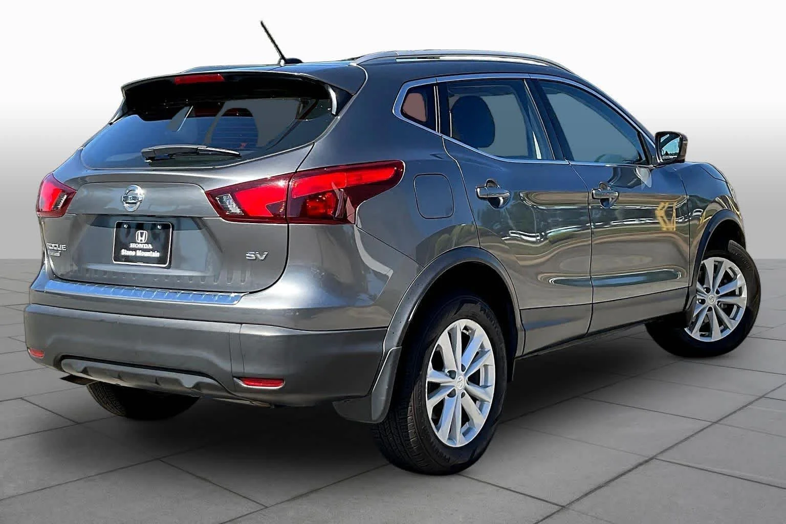 Used 2018 Gun Metallic Nissan SV image 13