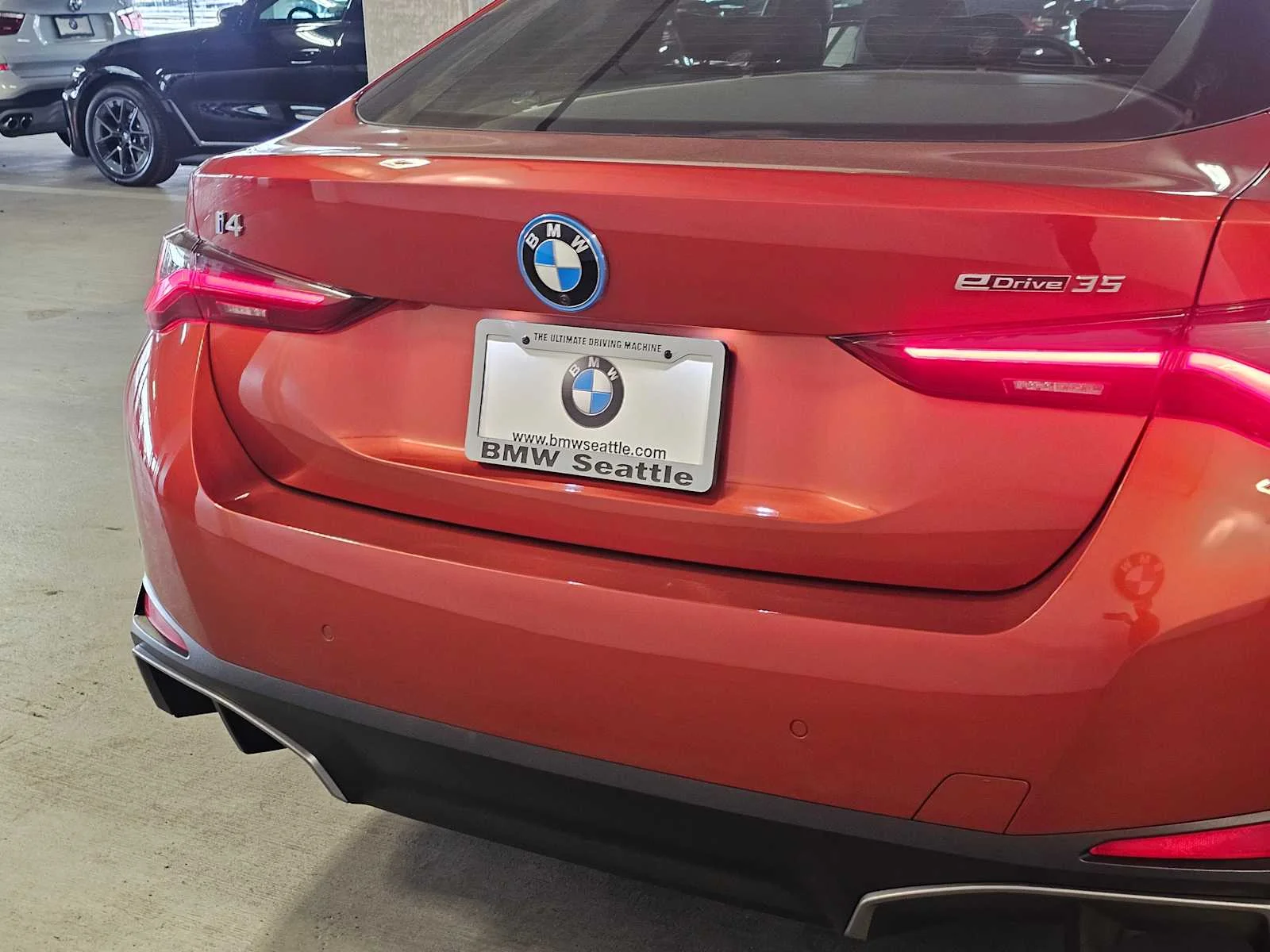 Certified Used 2023 Sunset Orange Metallic BMW eDrive35 image 7