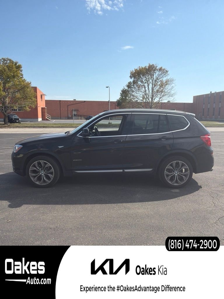 Used 2015 Black Sapphire Metallic BMW xDrive28i image 1