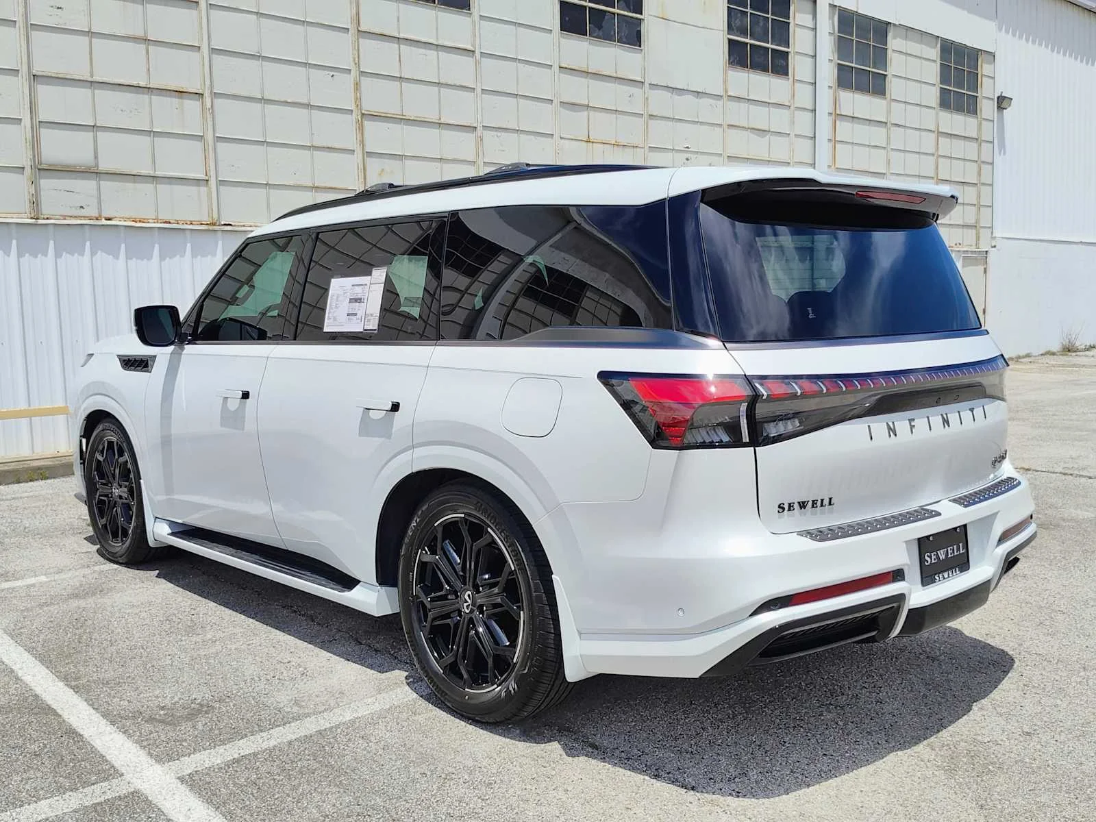 New 2026 RADIANT WHITE INFINITI Sport 4WD image 6