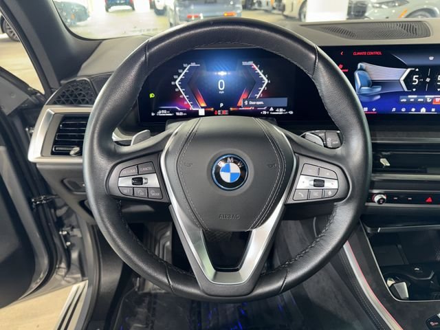 Certified Used 2025 Skyscraper Grey Metallic BMW xDrive50e image 21