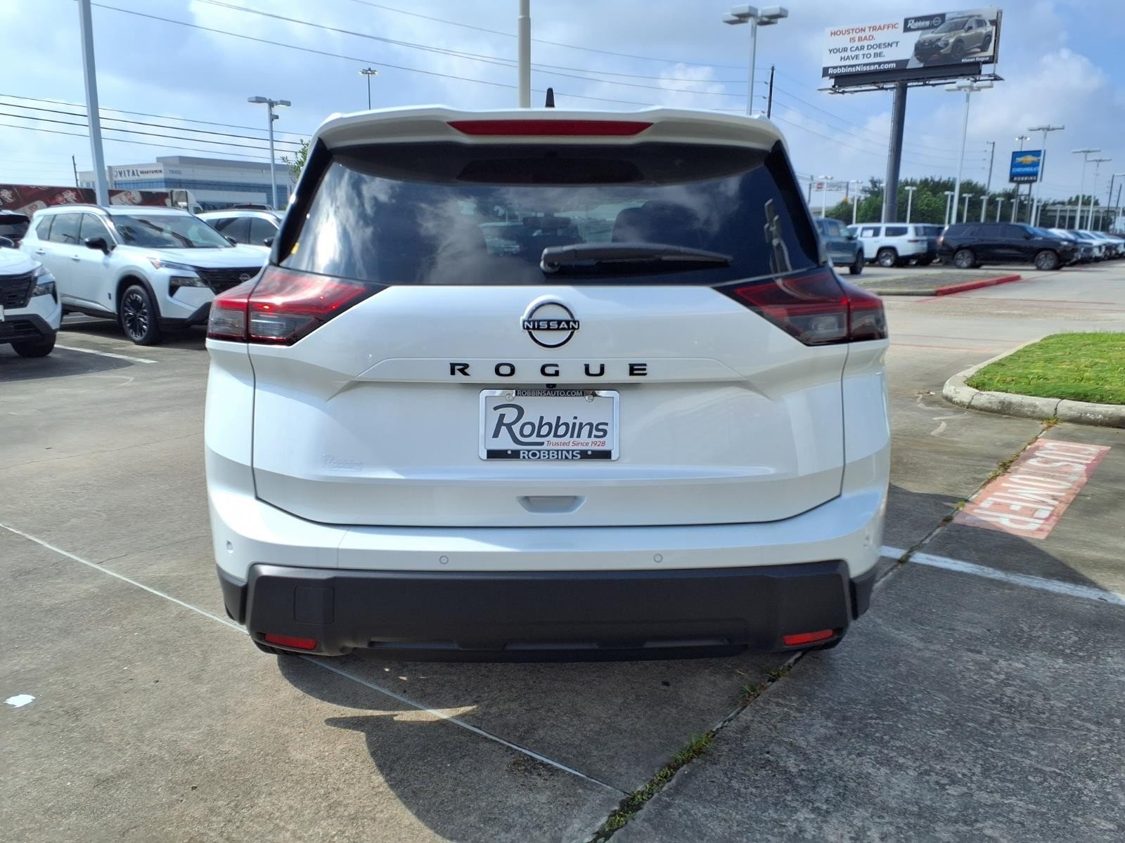 2026 Nissan Rogue Dark Armor™ White at Robbins Nissan
