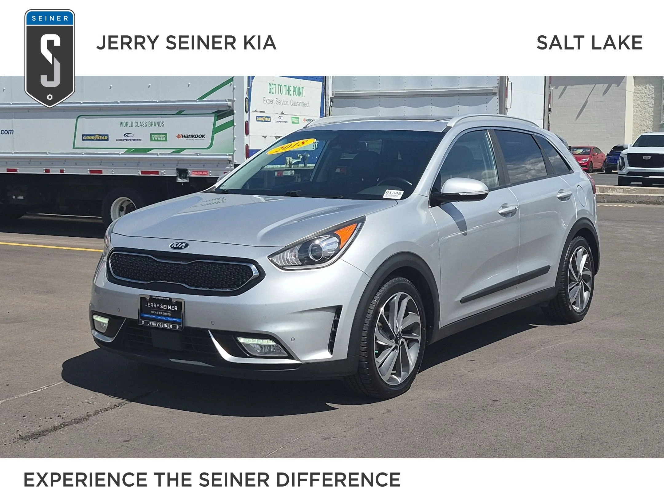 Used 2018 Silky Silver Kia Touring image 1