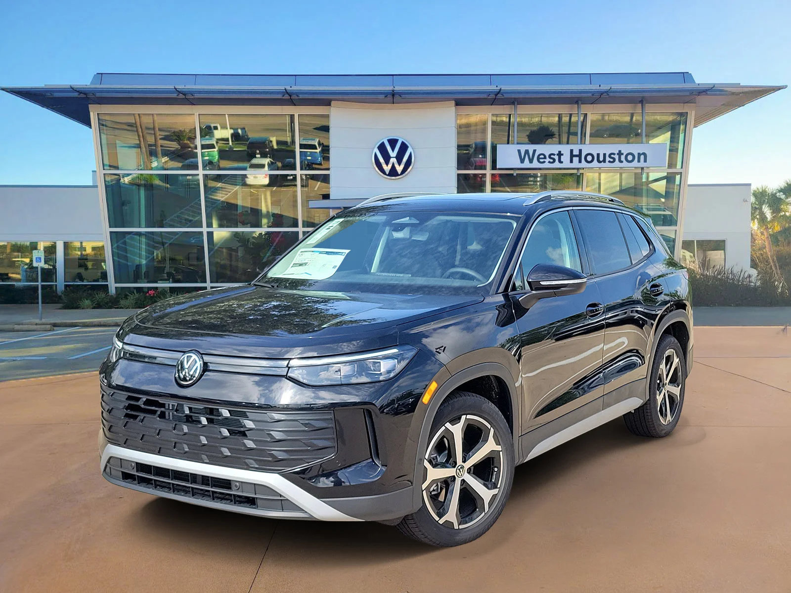 New 2026 Black Volkswagen SE image 1